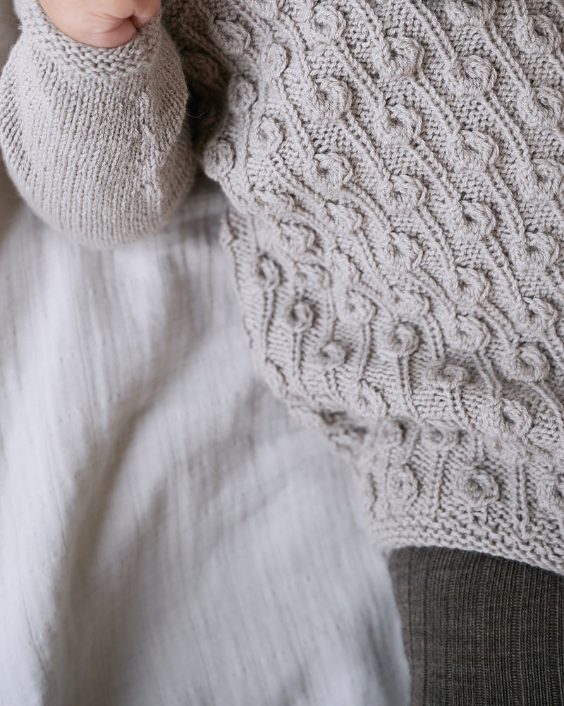 Bean Sprout Romper – Strickanleitung & Garnpaket - BONIFAKTUR - Kleinste -Bean Sprout Romper Baby